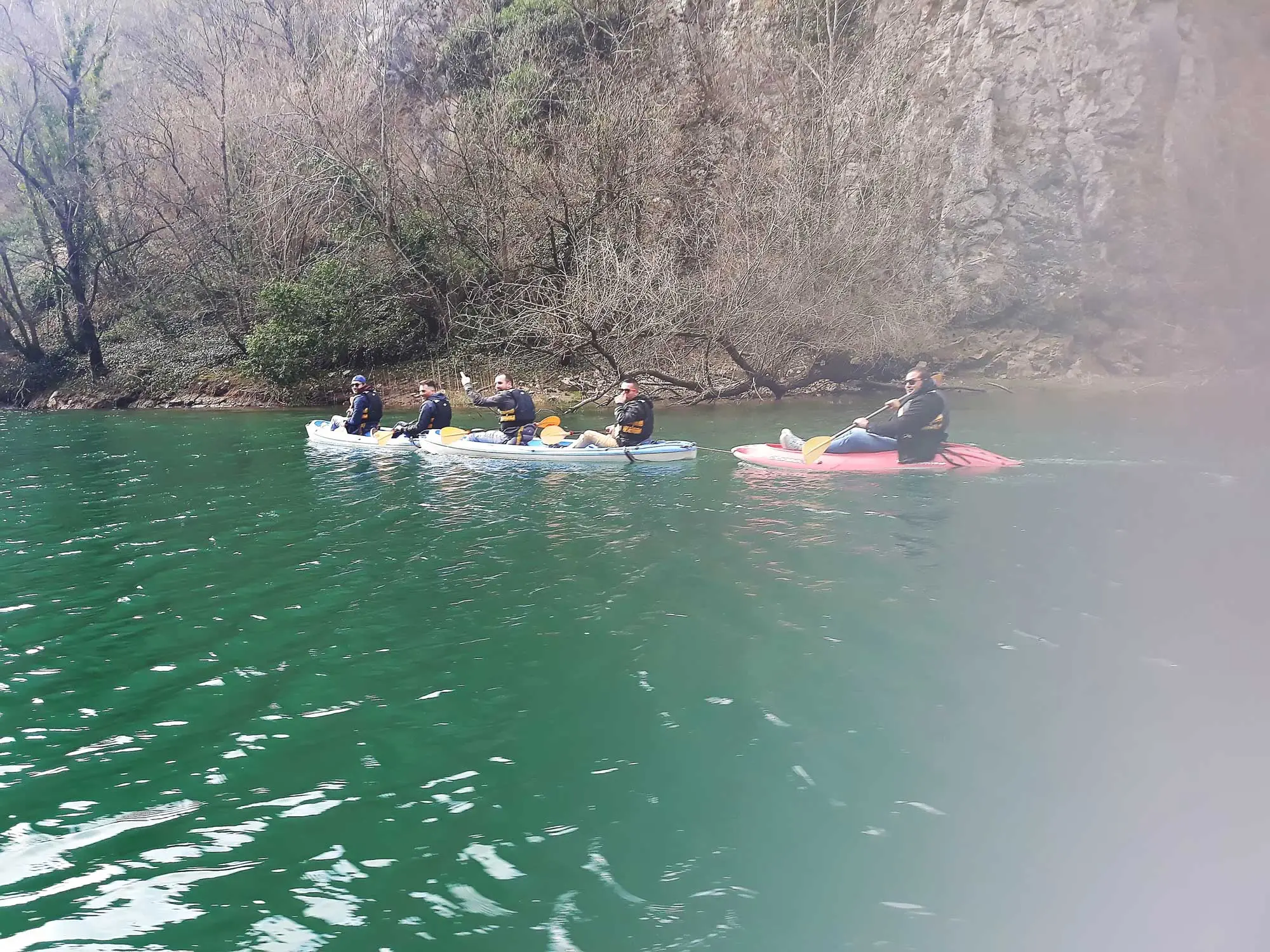 Kayaks on a calm canyon lake